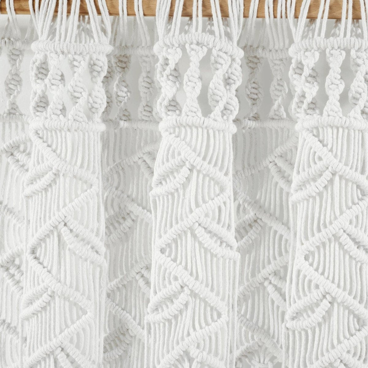 Boho Macrame Leaf Cotton Window Curtain showcasing intricate white macrame knots and design details.