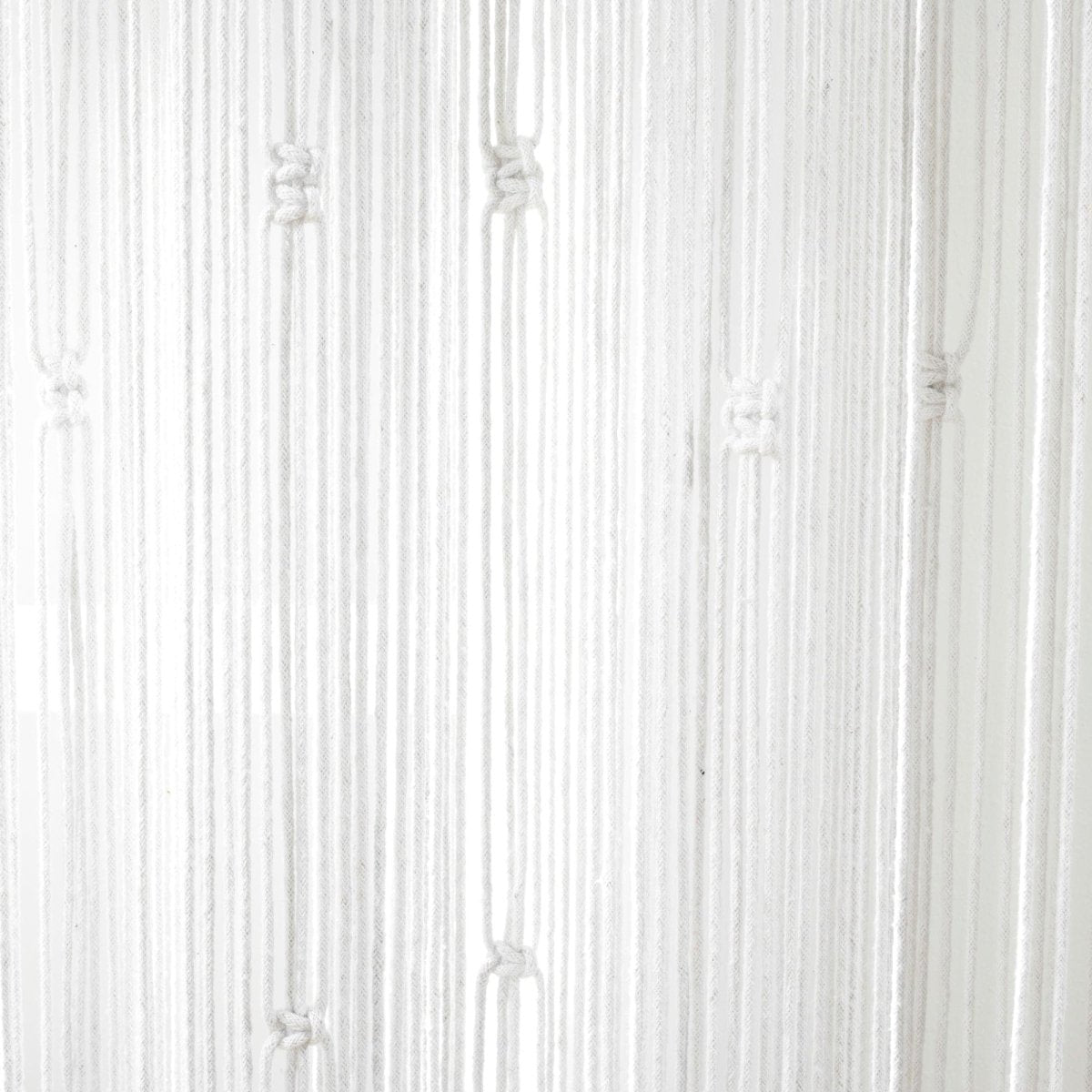 Boho Macrame Leaf Cotton Window Curtain showcasing intricate knots and flowy fringe design.