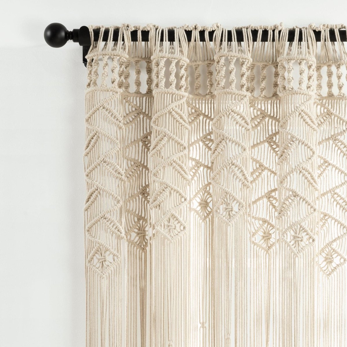 Boho Macrame Leaf Cotton Window Curtain showcasing intricate knots and flowing fringe design in natural tones.