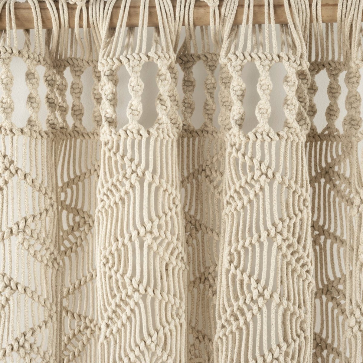 Boho Macrame Leaf Cotton Window Curtain showcasing intricate knots and textures on a natural fabric.