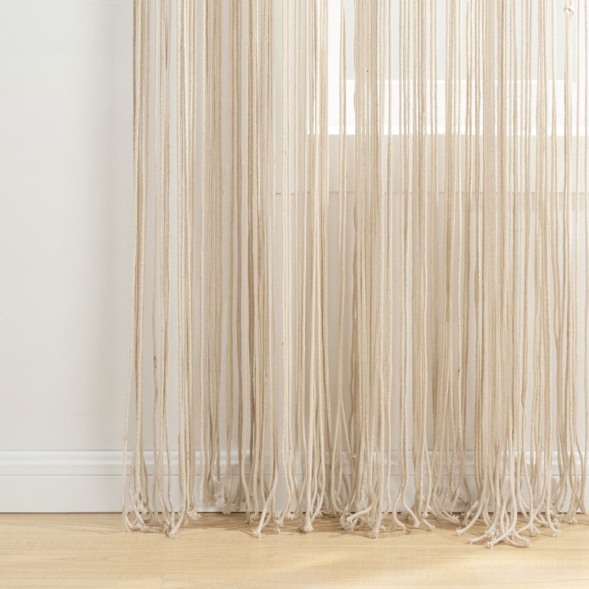Boho Macrame Leaf Cotton Window Curtain showcasing elegant flowing fringe and intricate knots.