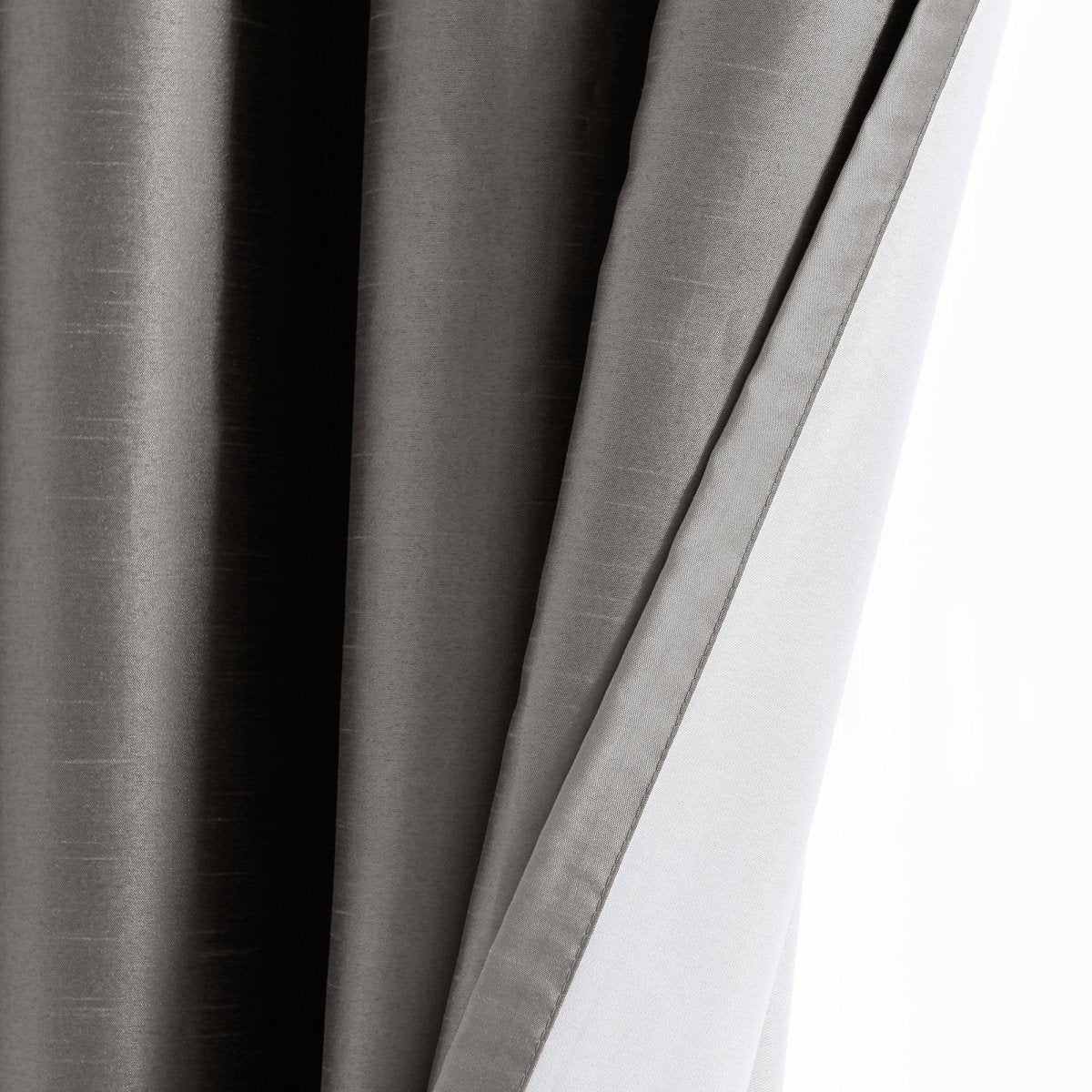 Faux Silk 100% Blackout Window Curtain showcasing smooth texture and solid color design, perfect for modern interior decor.