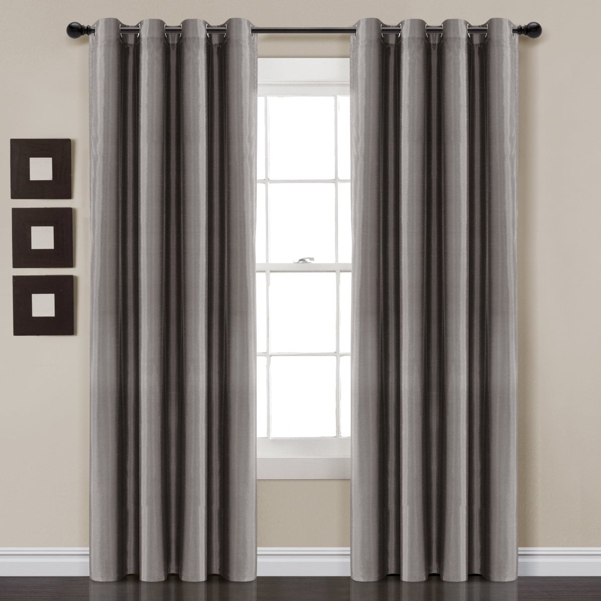 Faux Silk 100% Blackout Window Curtain panel in a modern living space, providing privacy and elegance.