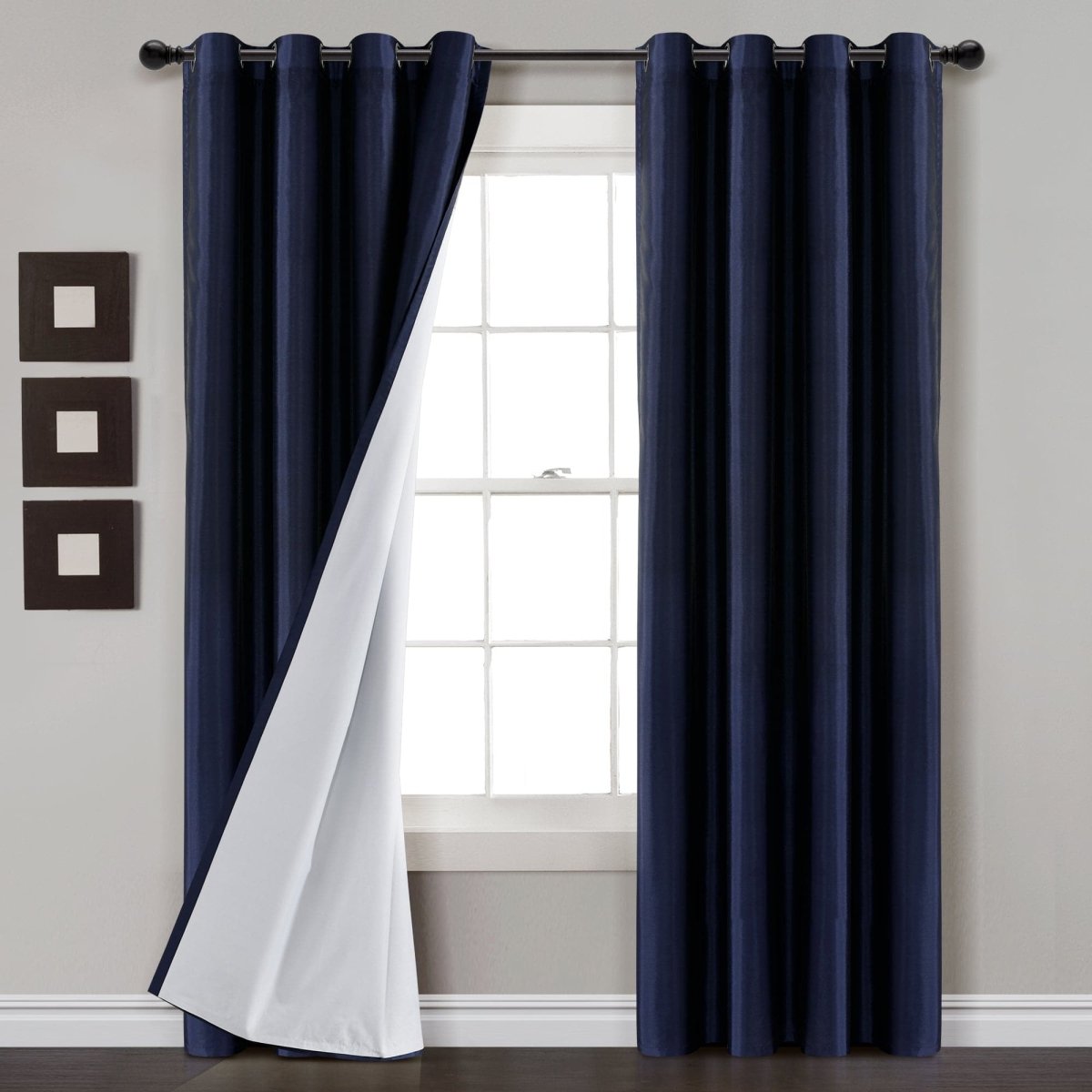 Faux Silk 100% Blackout Window Curtain panel in navy blue, providing complete privacy and a luxurious look.