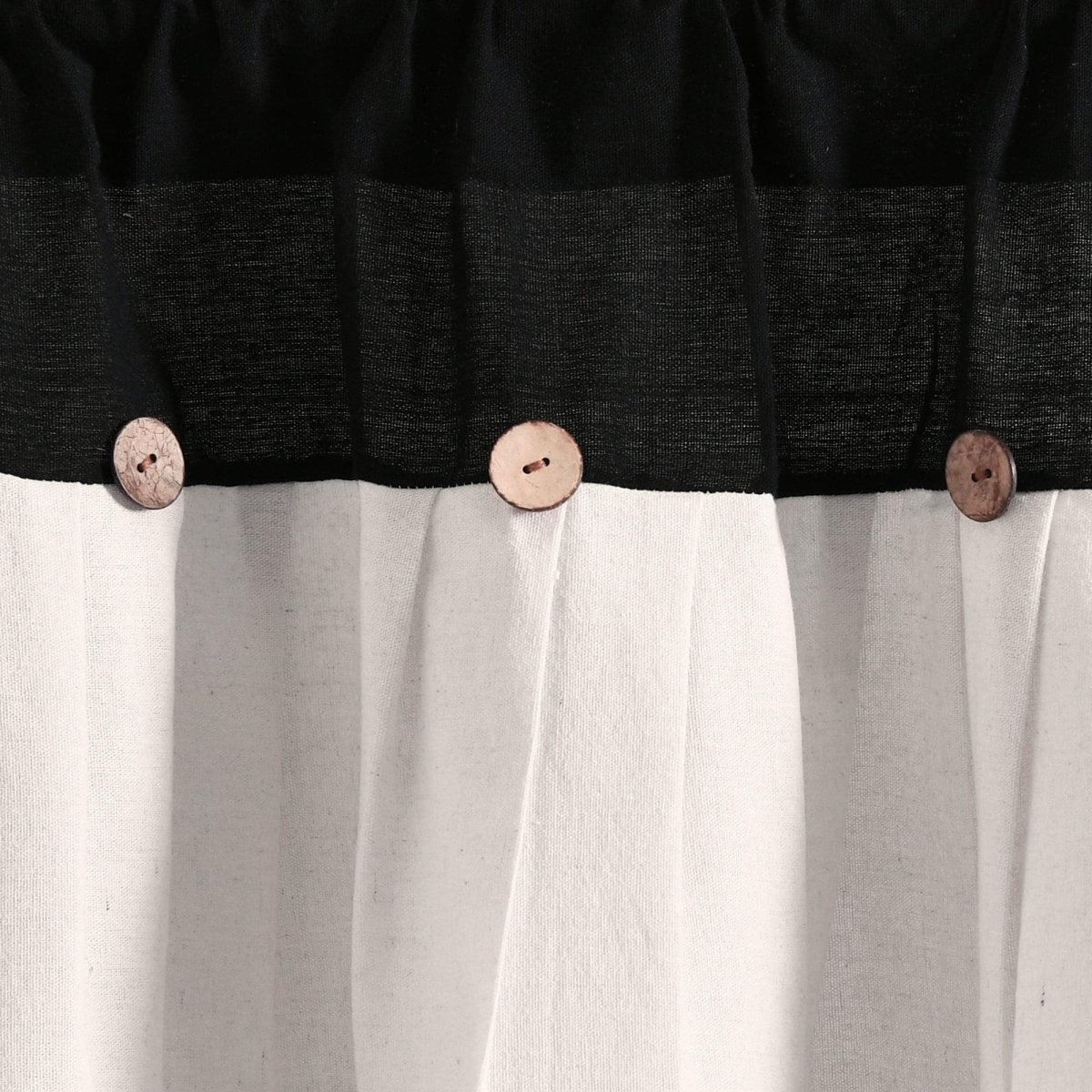 Linen Button Valance featuring pleats and wooden buttons, showcasing a stylish color block design in black and white.
