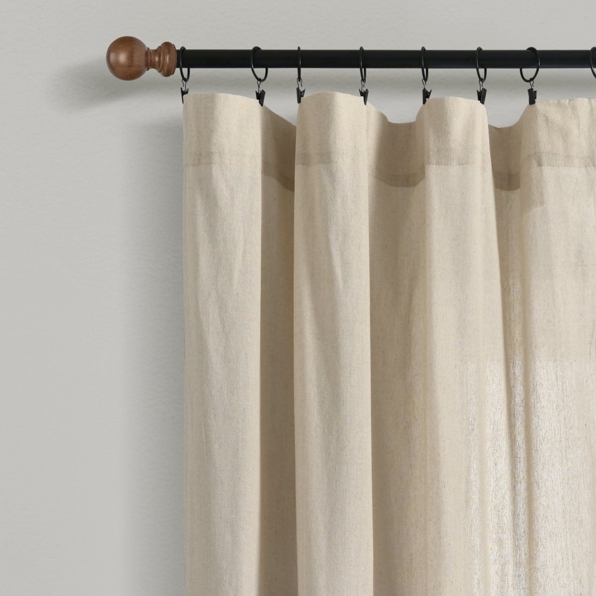 Linen Button Botanical Garden Window Curtain panel hanging on a black curtain rod with wooden finial, showcasing natural fabric texture.
