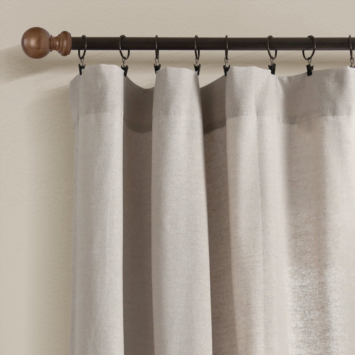 Linen Button Botanical Garden Window Curtain hanging on a decorative rod showcasing its airy and soft texture.