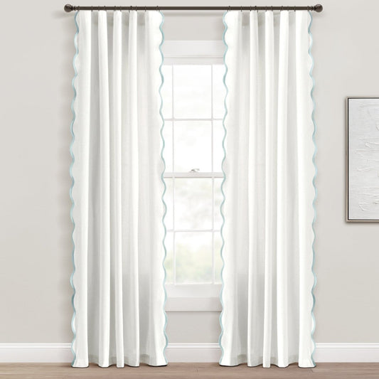 Coastal Chic Scalloped Edge Window Curtain Panel Set in a light airy setting, perfect for a beachy home design.