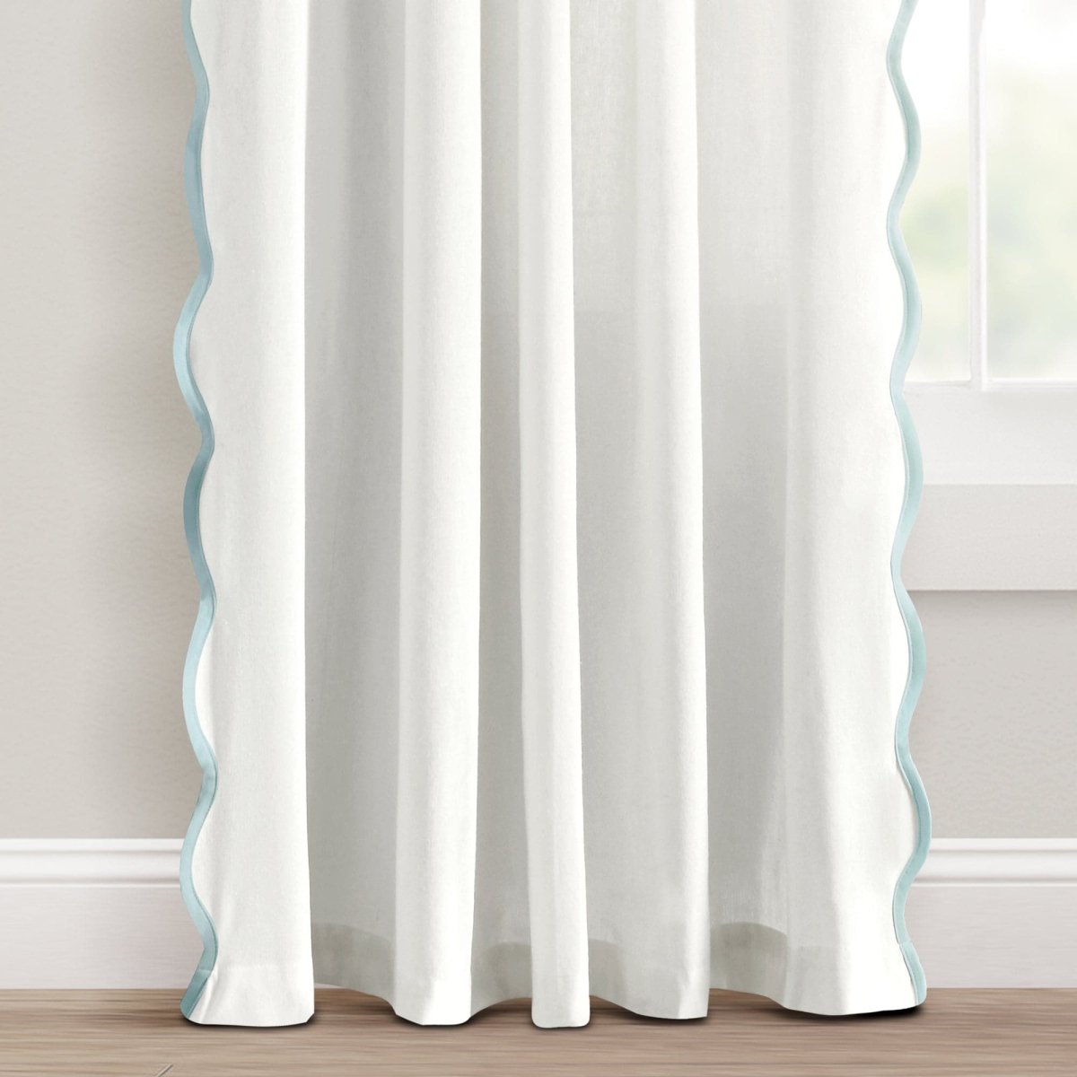 Coastal Chic Scalloped Edge Window Curtain Panel Set showcasing scallop edges and a soft, airy design in a bright room.