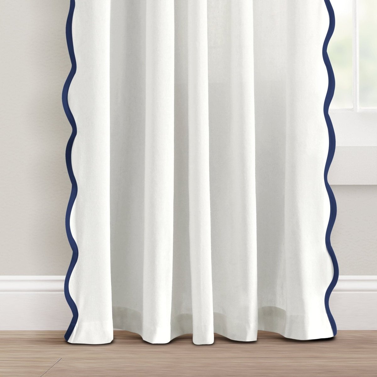 Coastal Chic Scalloped Edge Window Curtain Panel Set featuring white fabric with navy scallop edges.