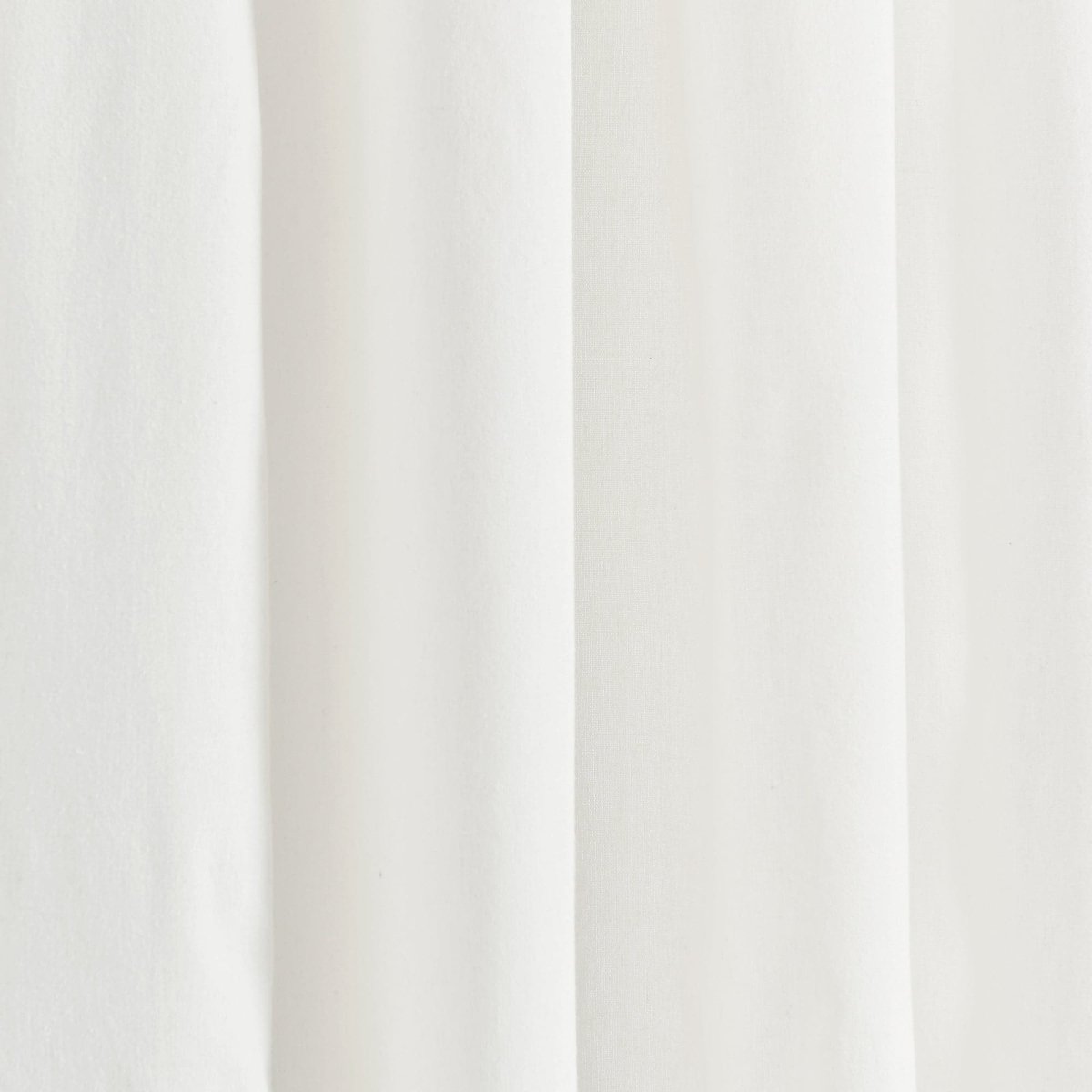 Coastal Chic Scalloped Edge Window Curtain Panel Set showcasing soft white fabric, perfect for adding coastal elegance to any room.
