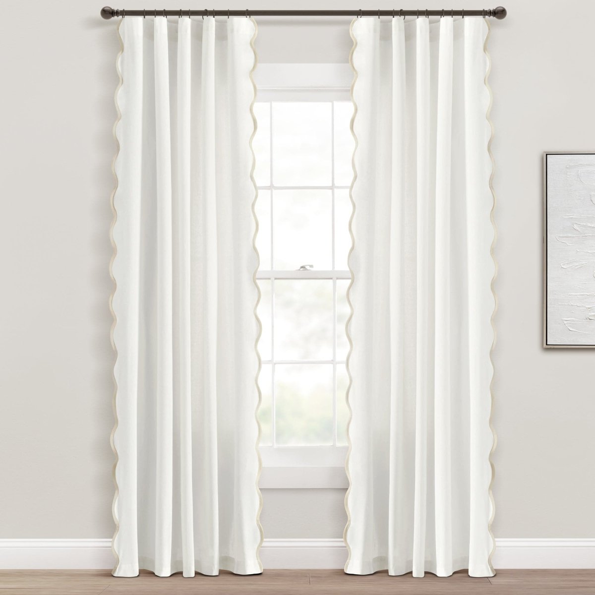 Coastal Chic Scalloped Edge Window Curtain Panel Set hanging elegantly in a bright room.