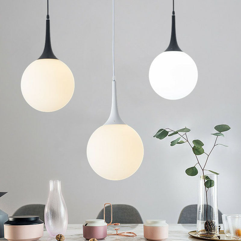 Adeline Modern Globe Pendant - Stylish Glass Light for Dining Rooms