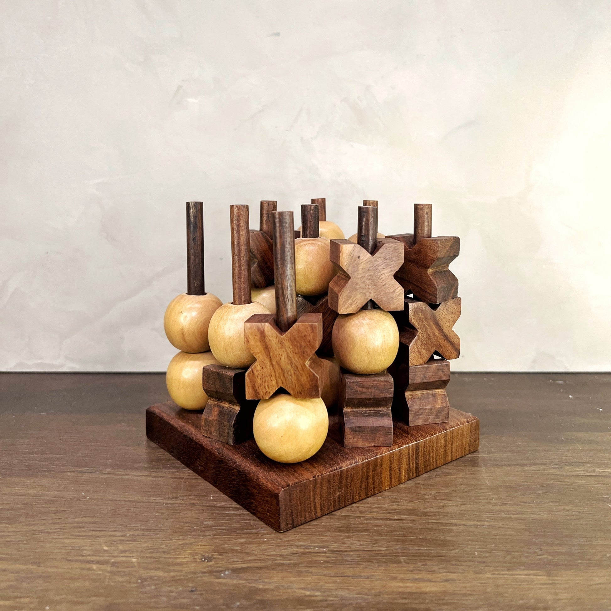 Kanan 3D Tic Tac Toe game featuring hand-carved stackable pieces made from Indian rosewood.