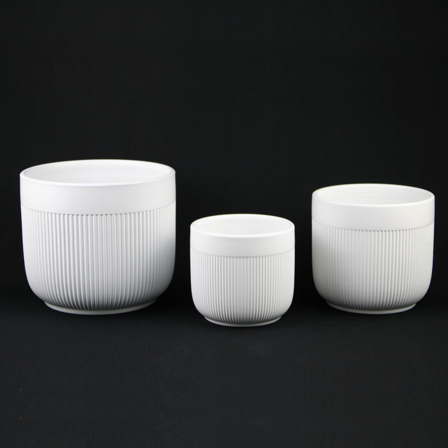 3-Piece White Stoneware Planter Pot Set with Vertical Line Texture
