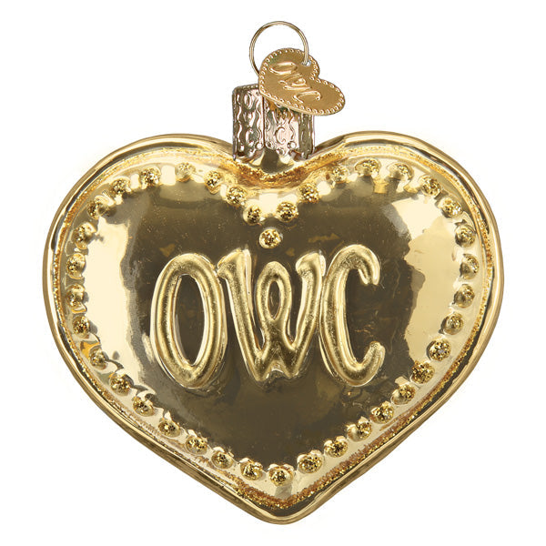Gold heart-shaped ornament with 'OWC' engraving on a white background
