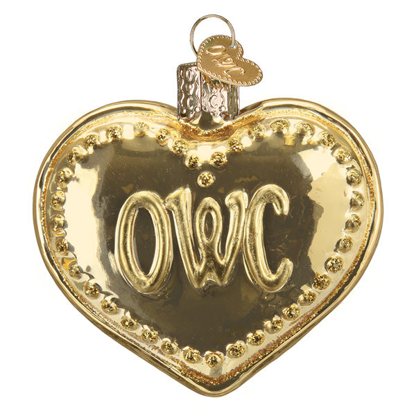 Gold heart-shaped ornament with 'OWC' engraving on a white background