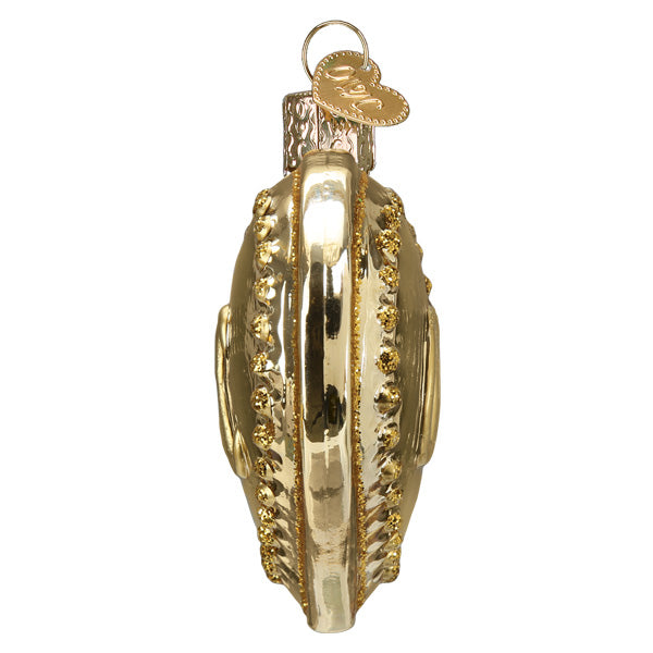 Gold Christmas ornament on a white background