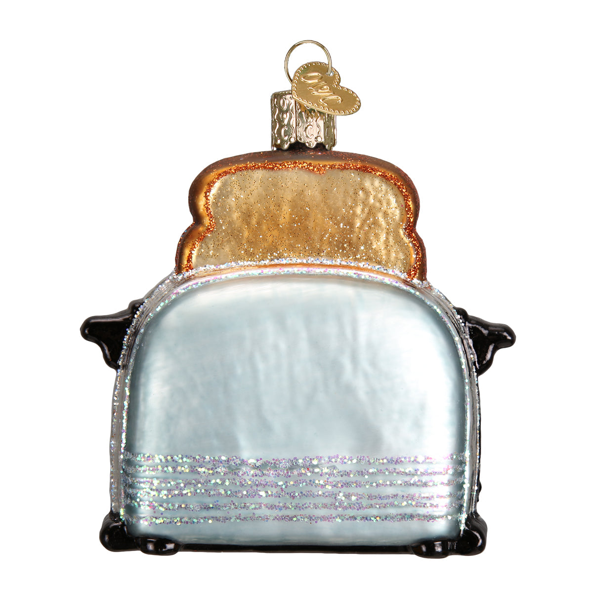 Glass ornament shaped like a toaster with bread slices on a white background