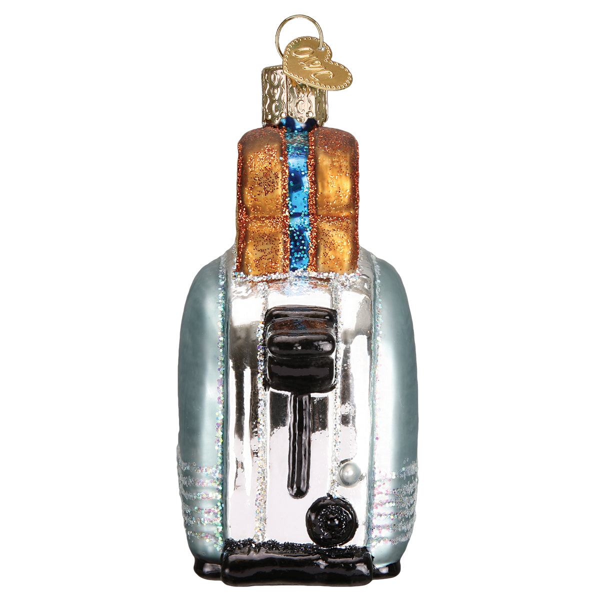 Glass ornament resembling a vintage toaster with bread on a white background