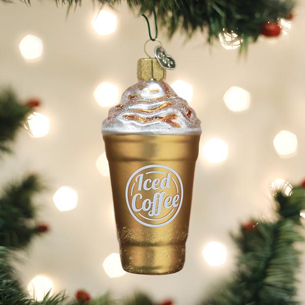 Blended Coffee Ornament hanging on a Christmas tree with festive lights.
