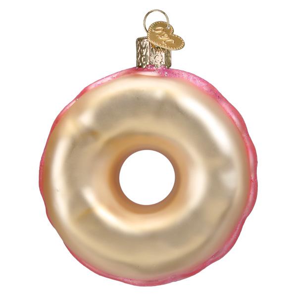 Donut-shaped ornament with pink and gold colors on a white background