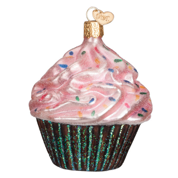 Decorative cupcake ornament with pink frosting and sprinkles on a white background