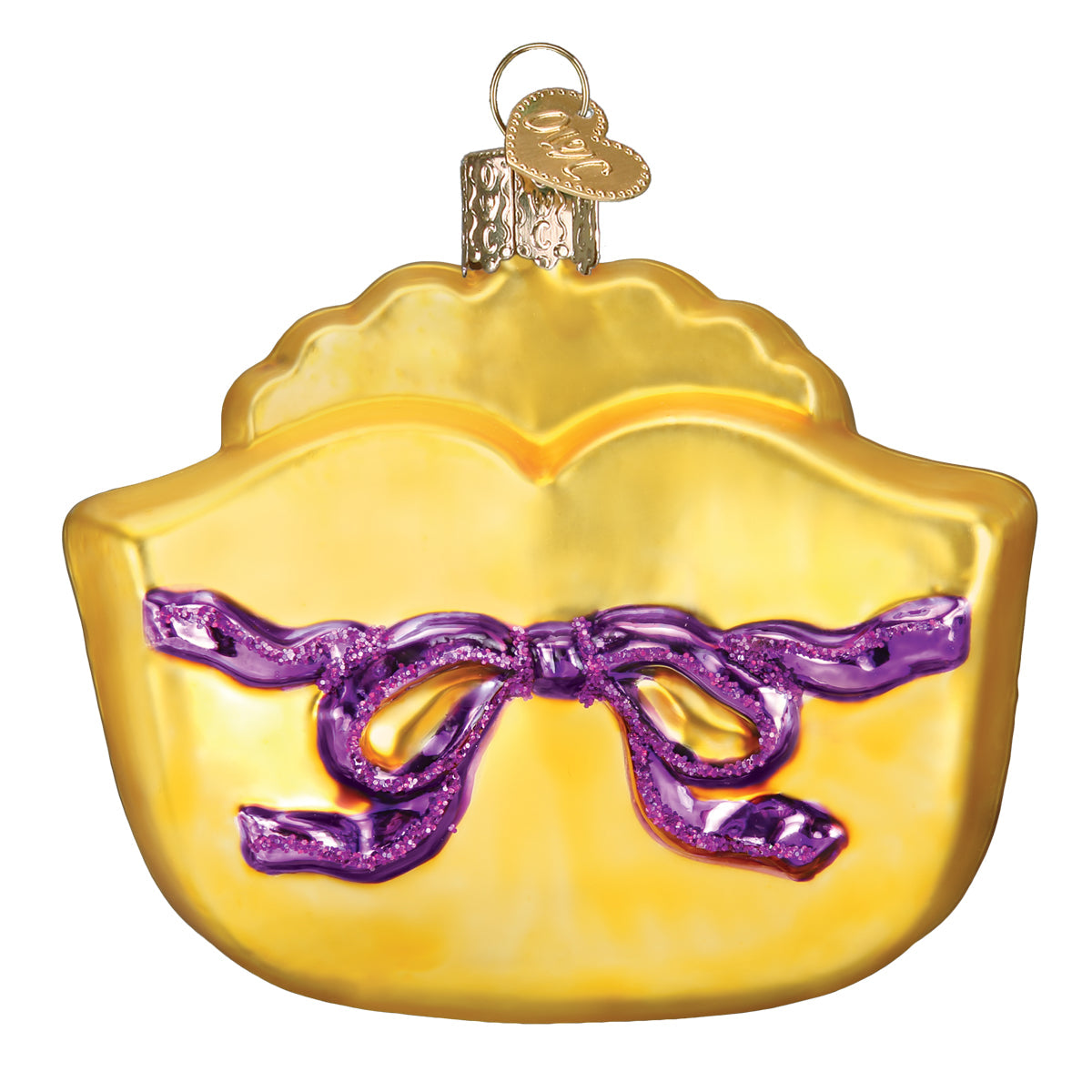 Decorative ornament shaped like a yellow mardi gras mask with a purple bow on a white background