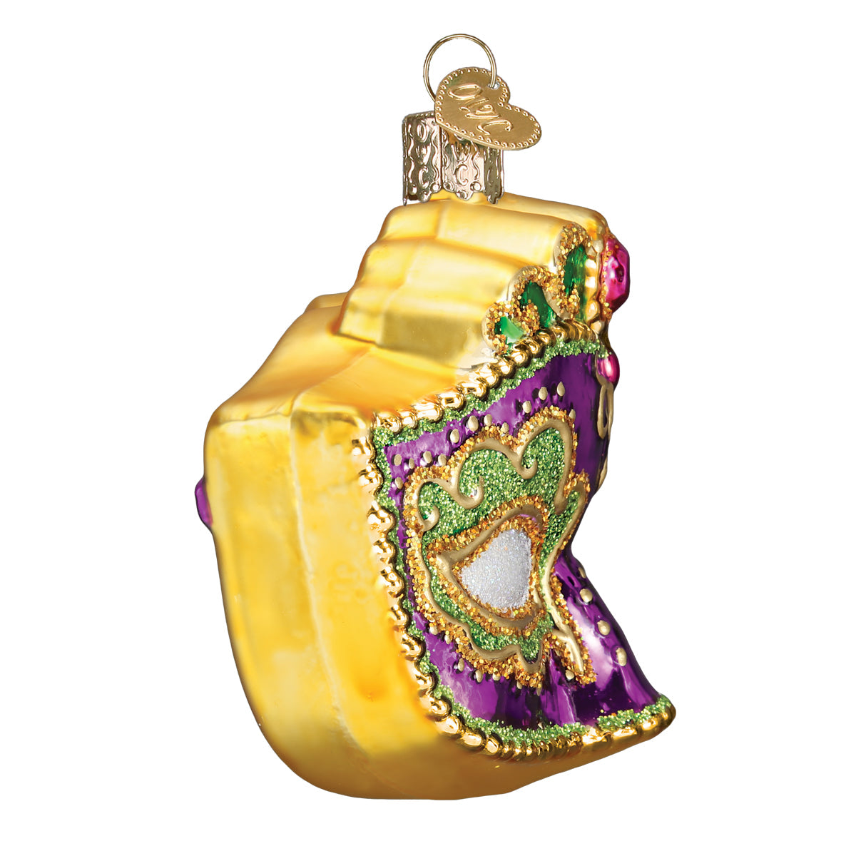 Decorative glass ornament shaped like a Mardi Gras mask with gold accents on a white background