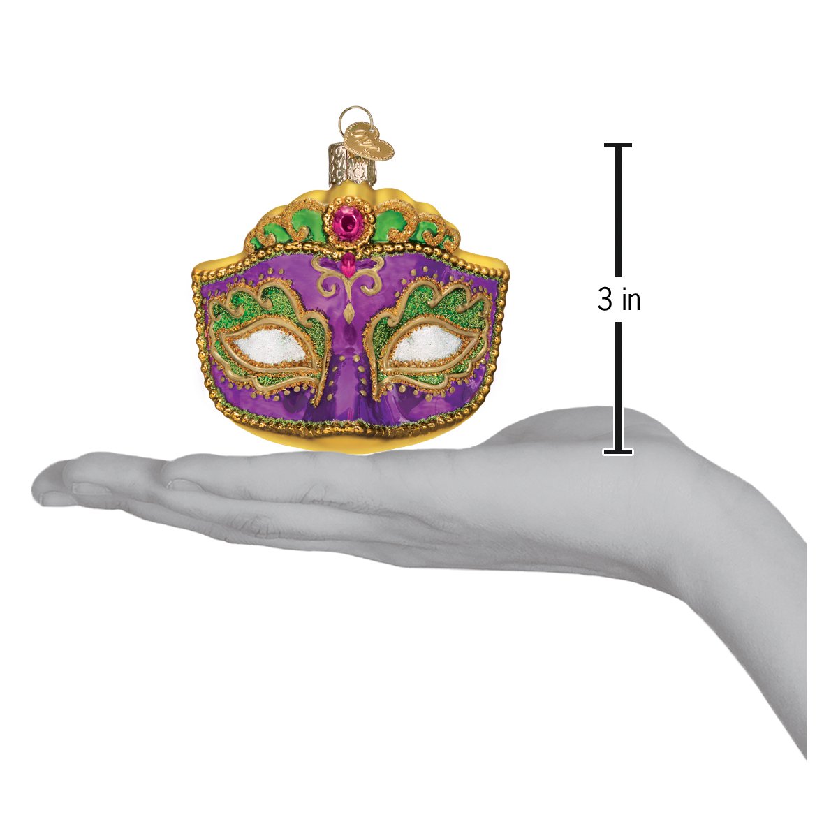 Decorative mask ornament with measurement on a hand
