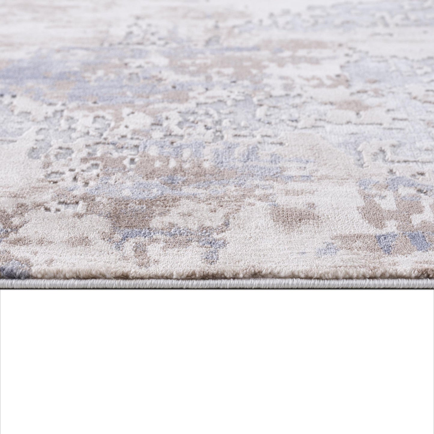 7' X 10' Beige And Ivory Abstract Area Rug