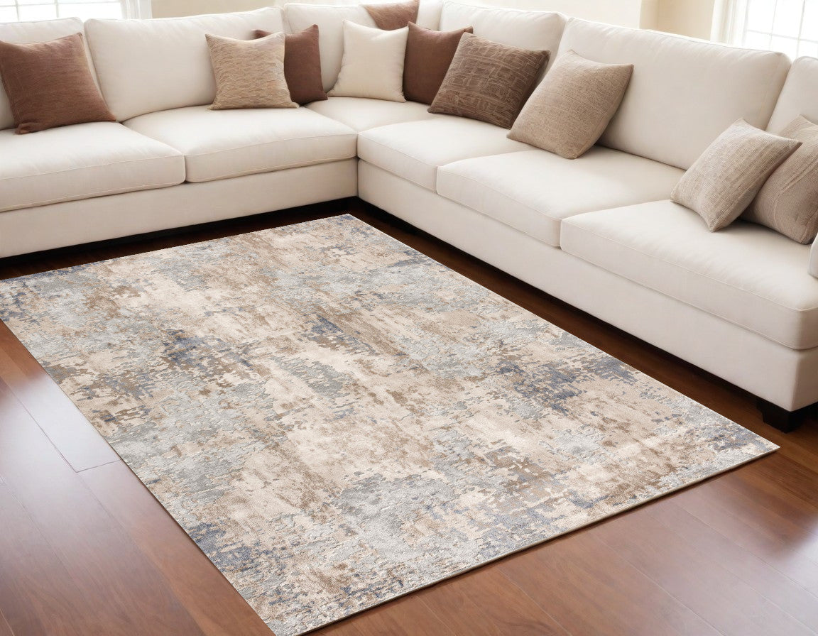 7' X 10' Beige And Ivory Abstract Area Rug