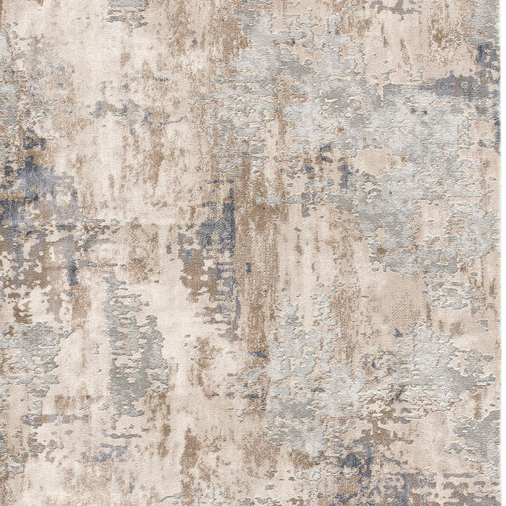 7' X 10' Beige And Ivory Abstract Area Rug