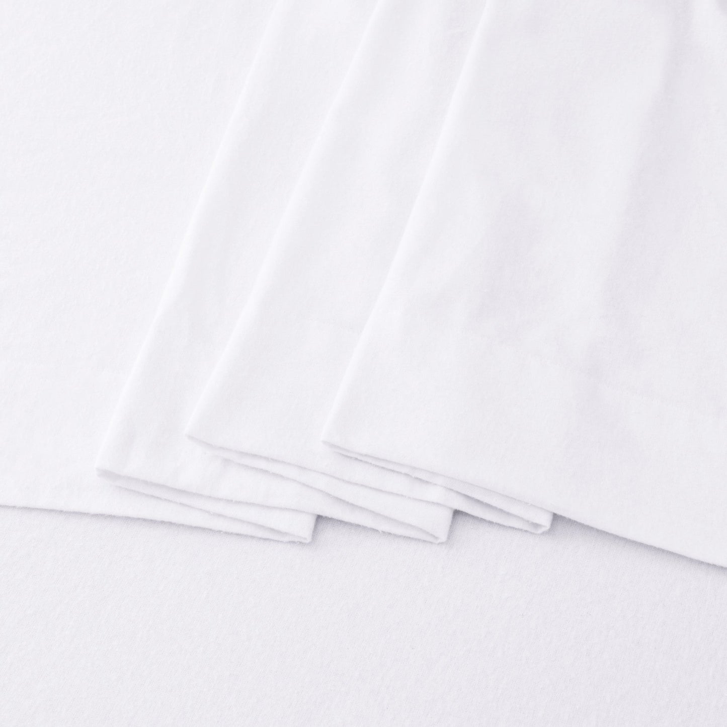 Stack of white sheets on a white background
