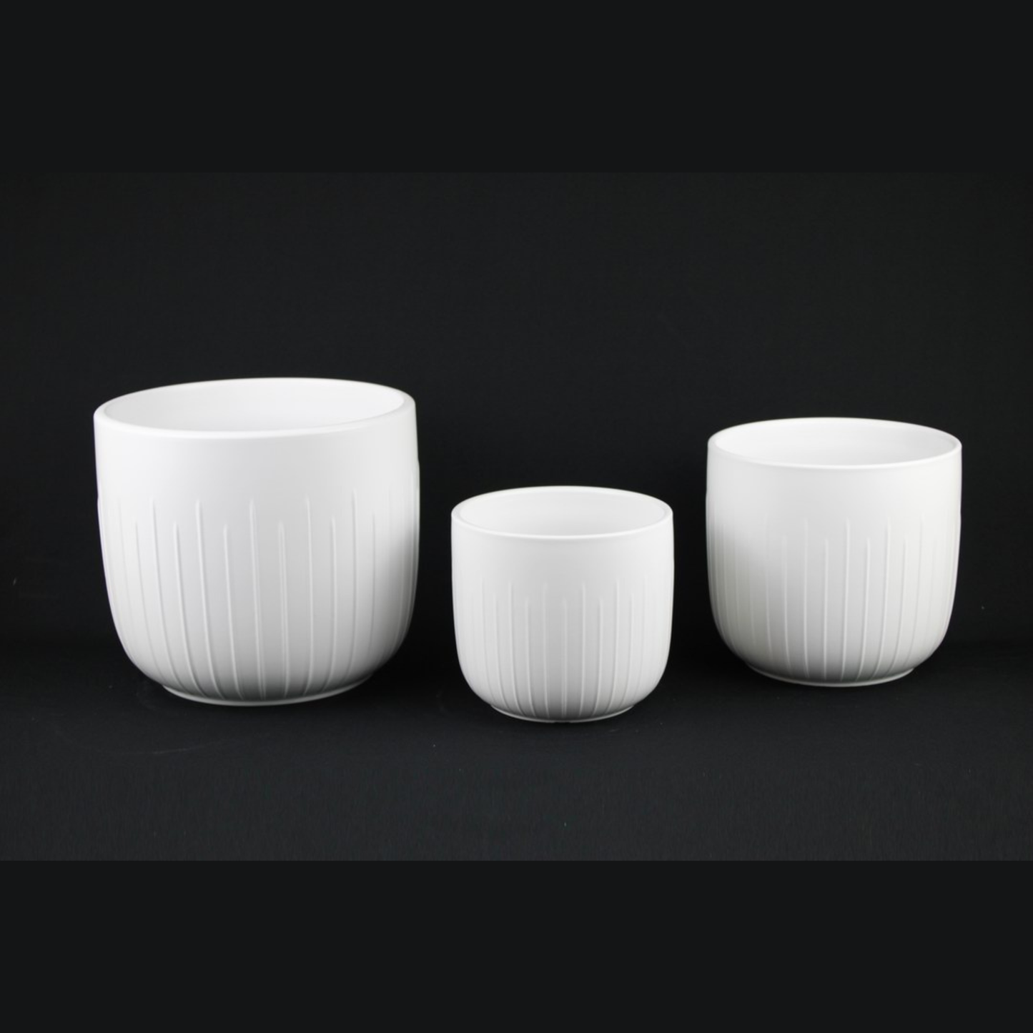 3-Piece White Stoneware Planter Pot Set with Vertical Groove Texture