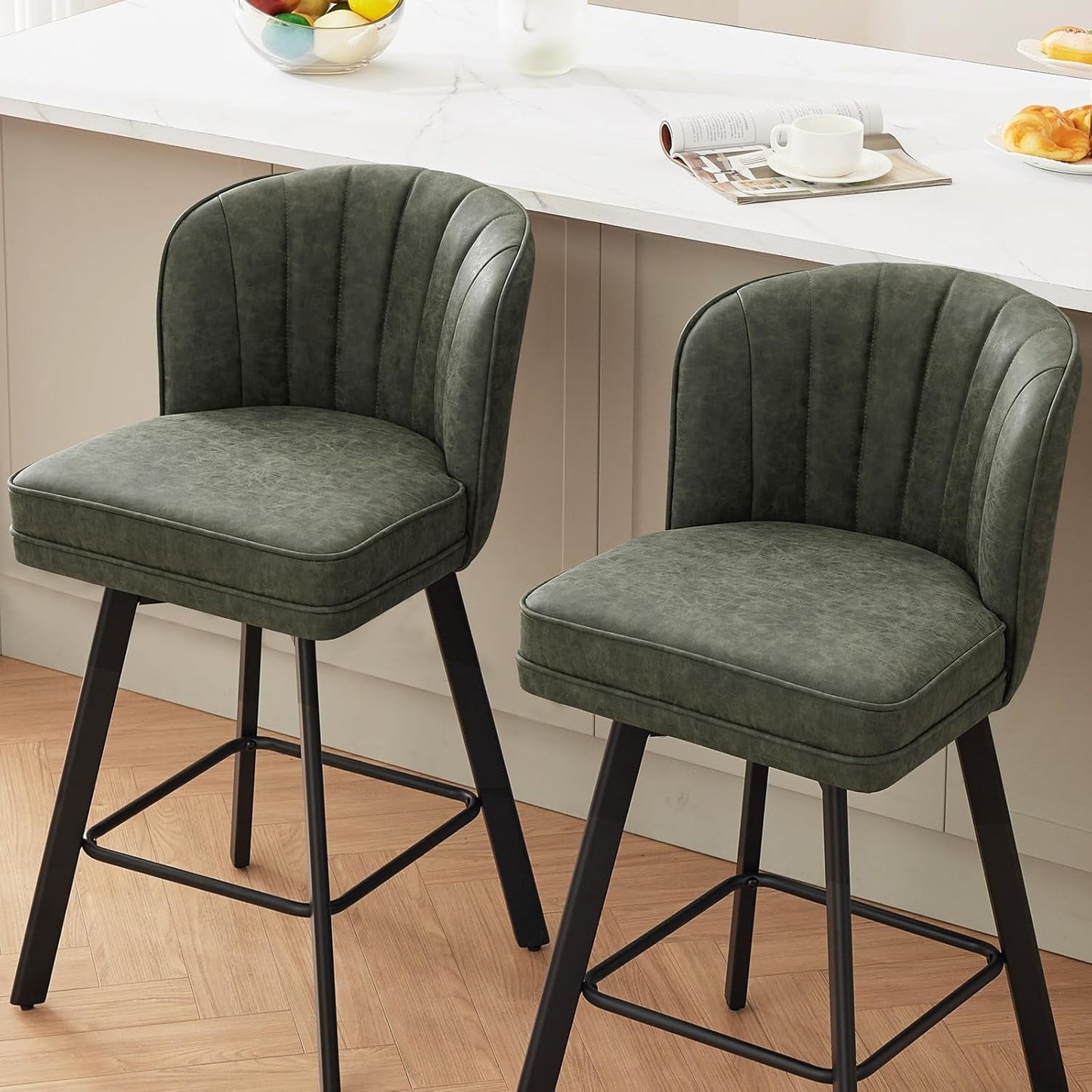 Swivel Counter Height Bar Stools Green Faux Leather with stylish shell-inspired backrest and sturdy black legs.