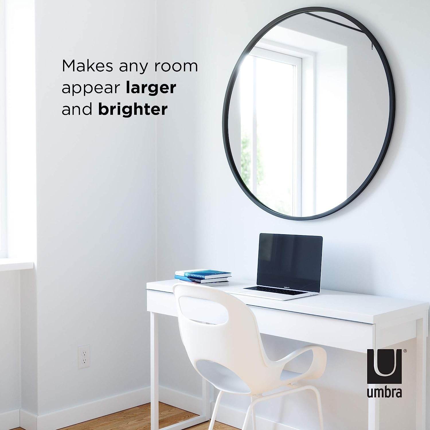 Round Rubber Wall Mirror 37 Inch diameter enhancing the brightness and space in a home office setting.