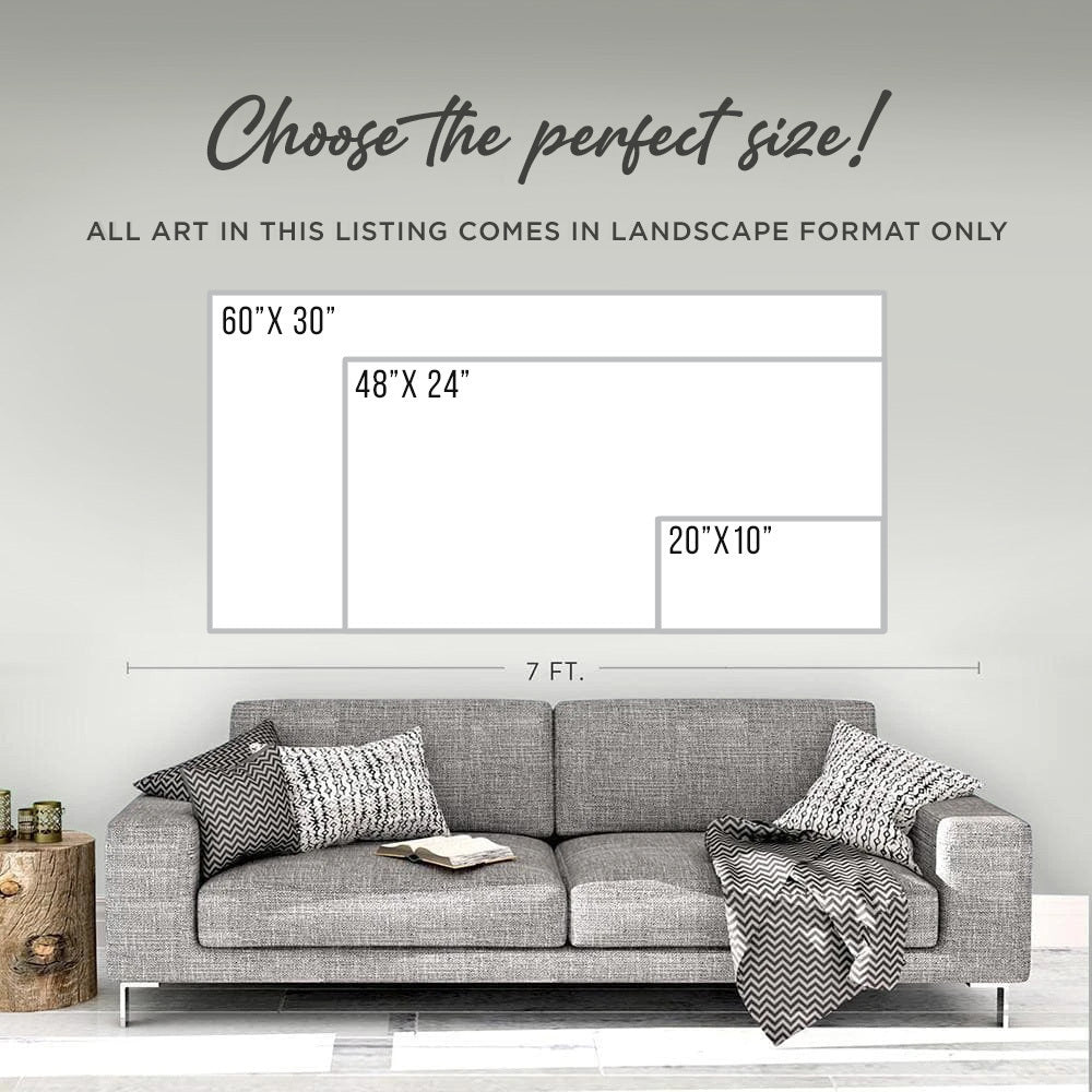 Sofa with decorative pillows and a blanket, featuring size chart on the wall above.