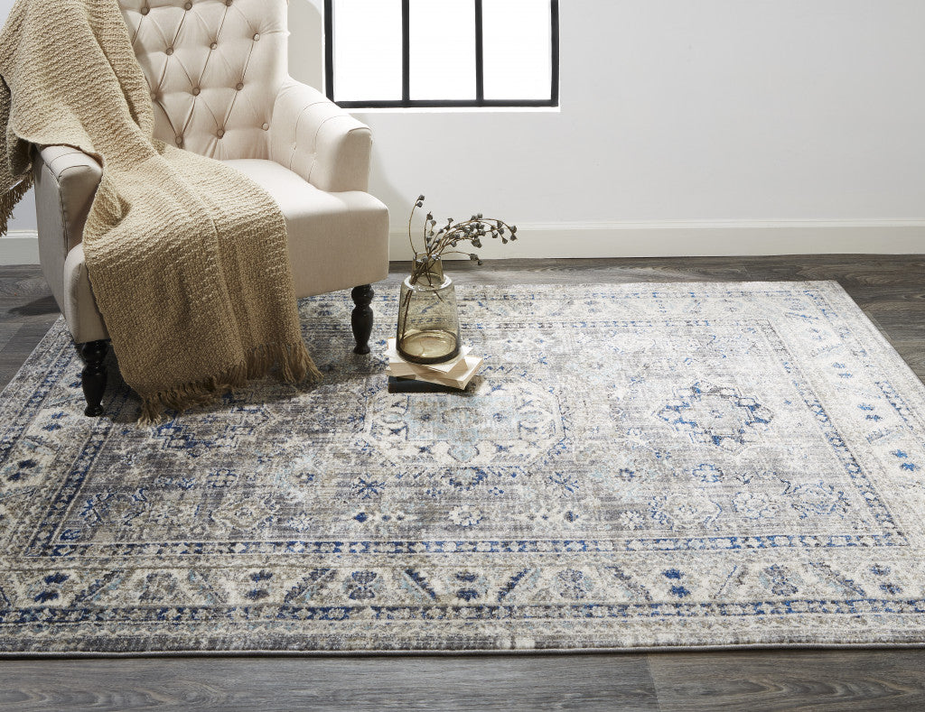 8' X 11' Taupe Gray And Blue Floral Stain Resistant Area Rug