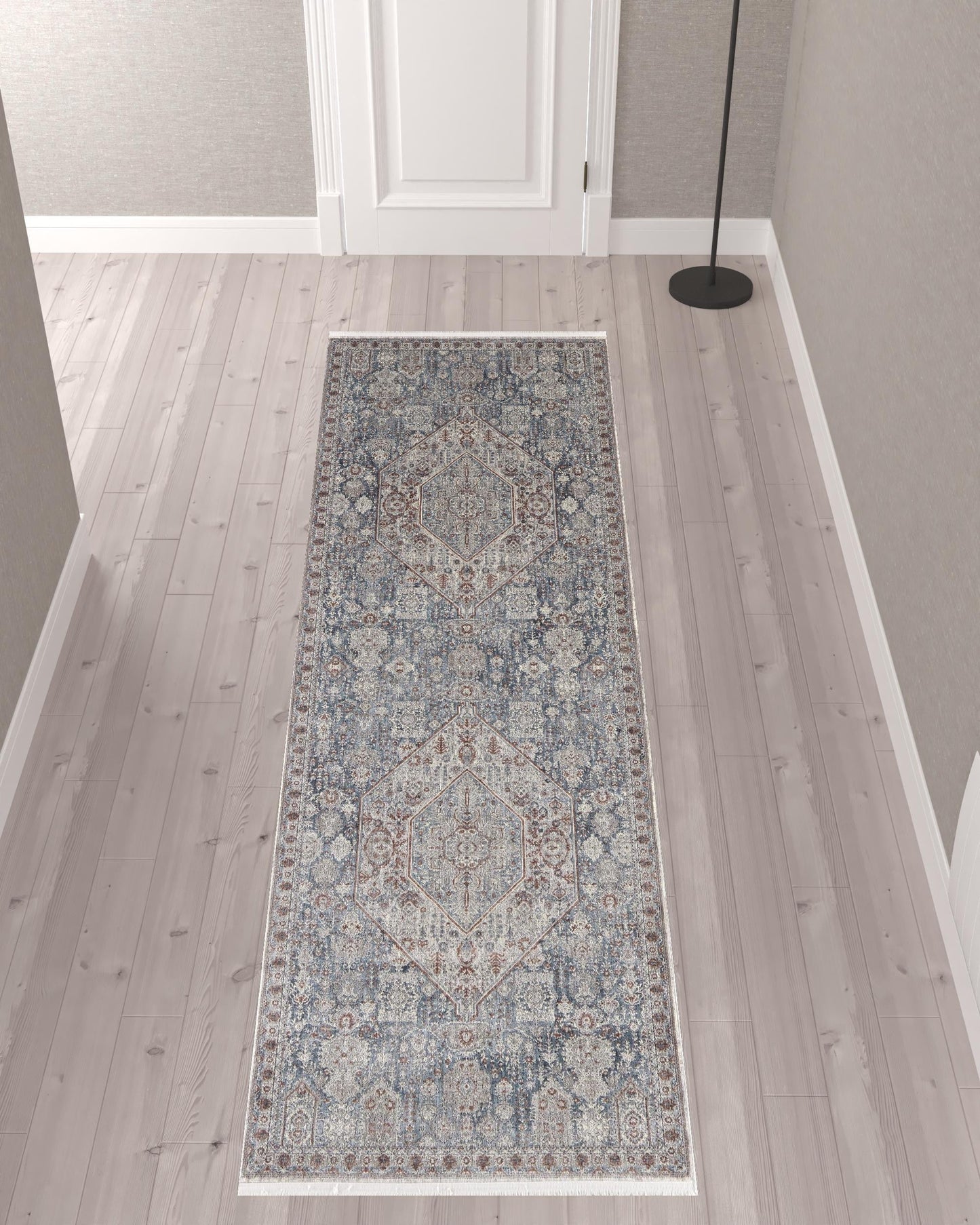 7' X 10' Blue And Ivory Floral Power Loom Stain Resistant Area Rug