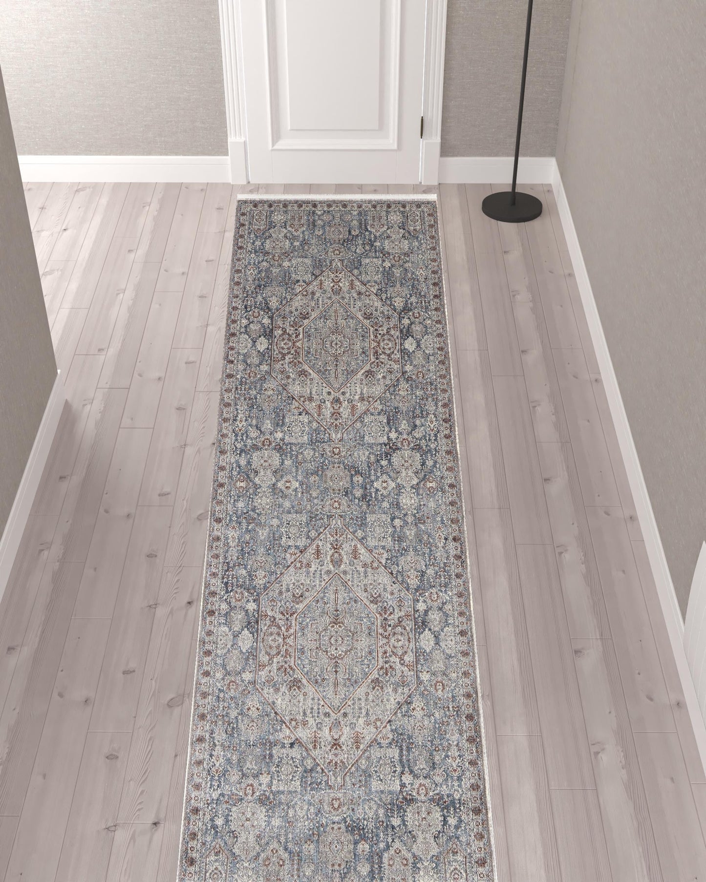 7' X 10' Blue And Ivory Floral Power Loom Stain Resistant Area Rug