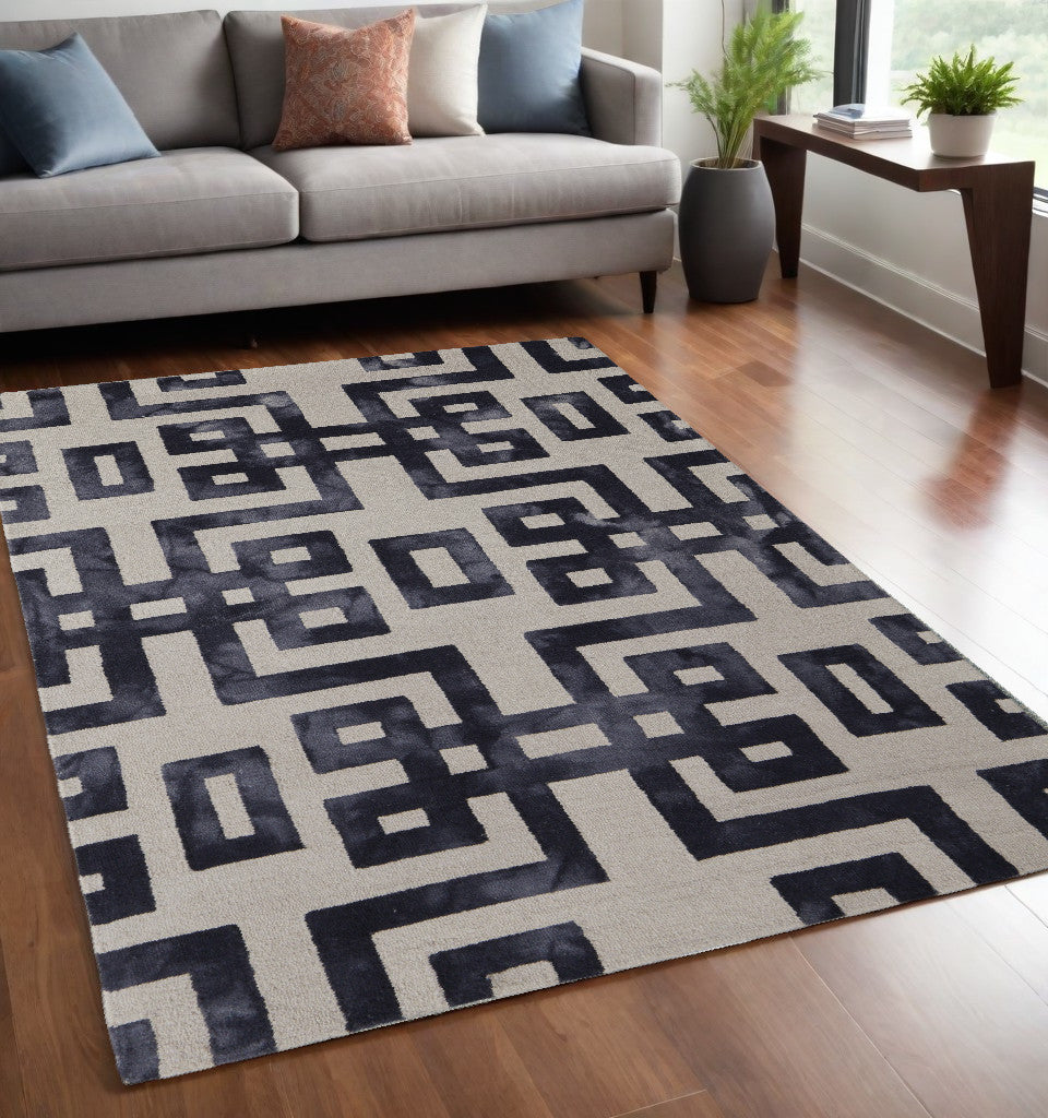 8' X 11' Ivory And Black Wool Tufted Handmade Area Rug