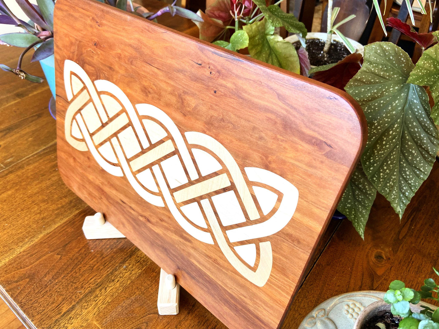 Cherry charcuterie board - complex Celtic knot inlay.