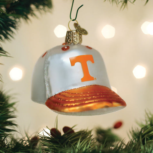 Tennessee Baseball Cap Ornament hanging on a tree with festive lights in the background.