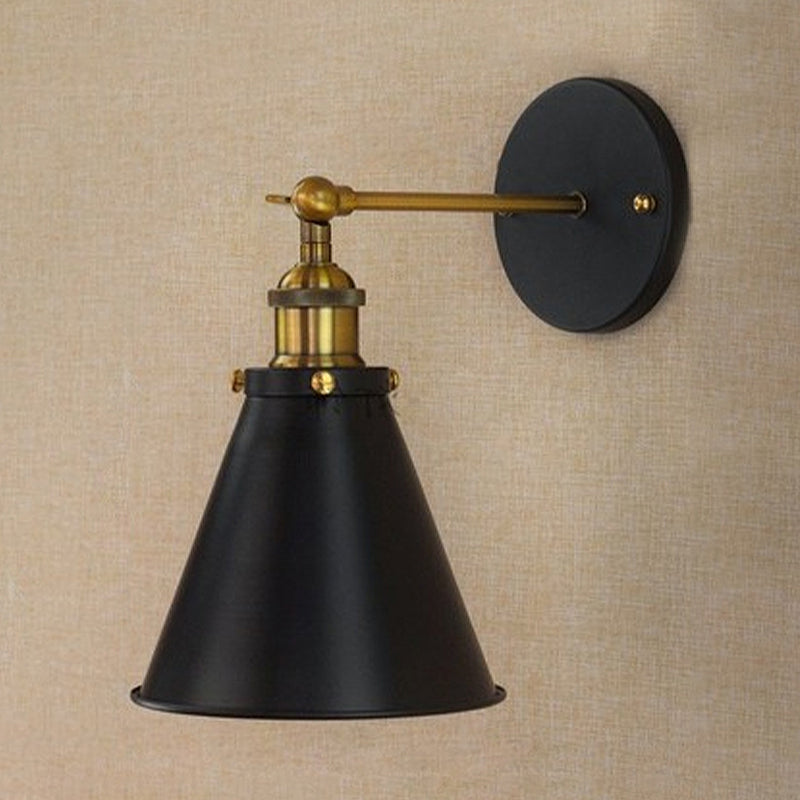 Embrace Industrial Chic with the Black and Brass Conic Sconce