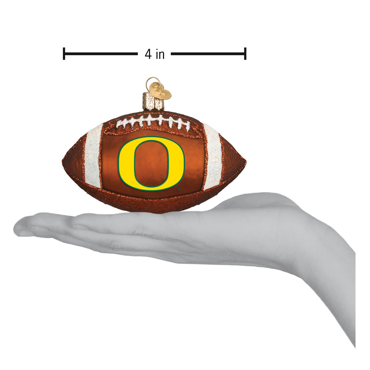 Oregon Football Ornament displayed on a hand, measuring 4 inches, featuring the Oregon logo on a football design.
