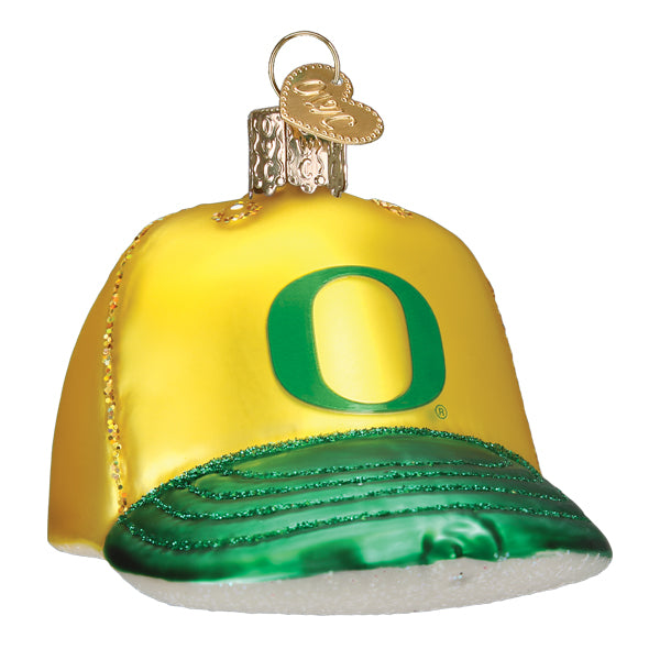 Oregon Baseball Cap Ornament featuring a yellow cap with green visor and logo, perfect for holiday decor.