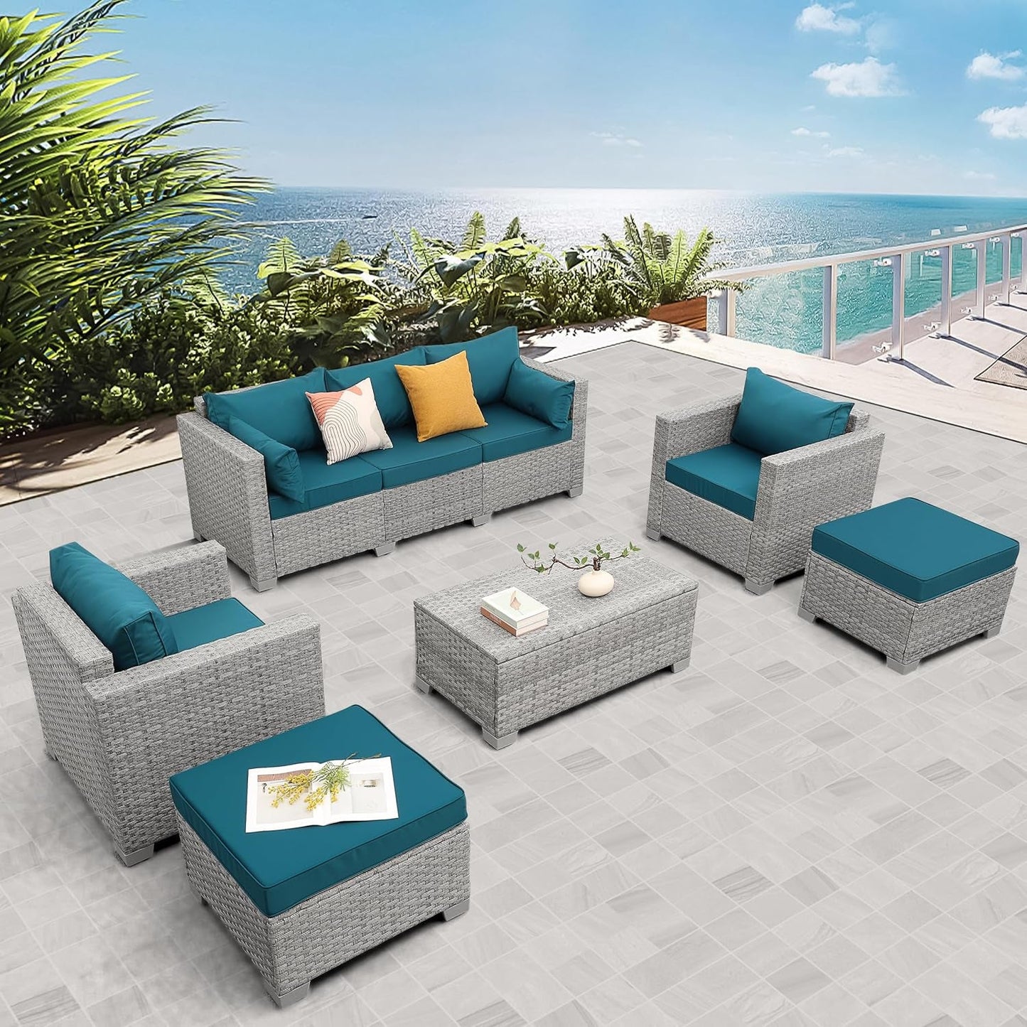 Patio Furniture Set 6 Piece Outdoor Grey Wicker Peacock Blue Cushions arranged on a patio by the beach.