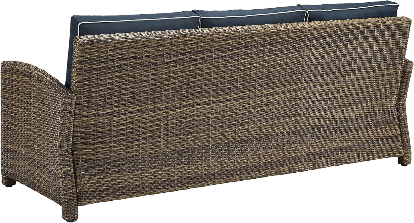Brown Wicker Outdoor Sofa with Navy Cushions showcasing a stylish and durable design for outdoor spaces.