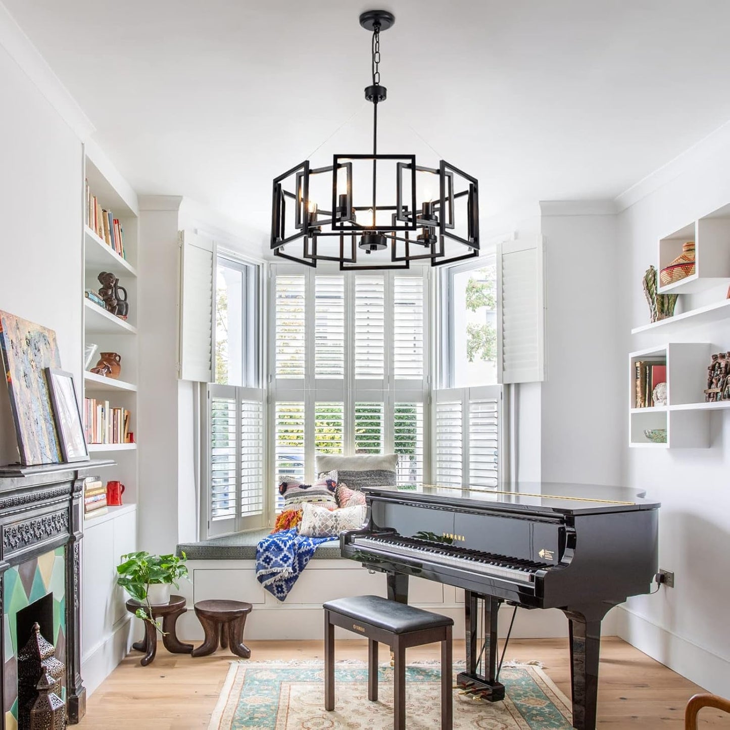 Industrial Style Five Light Matte Black Pendant Chandelier illuminating a stylish living space with a piano.